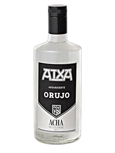Destileria Manuel ACHA - ATXA - ORUJO Blanco. Aguardiente de orujo. Botella de 70cl. agua de orujo blanco. Carácter fresco y vibrante. Sabor auténtico en cada vaso
